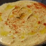 Receta de Rollo de queso crema con tomate y albahaca