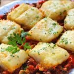 Receta de Dorada con langostinos al ajillo