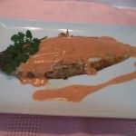 Receta de Mero en papillote con cebollitas en su jugo