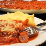 Receta de Codillo al horno con patatas y cebolla